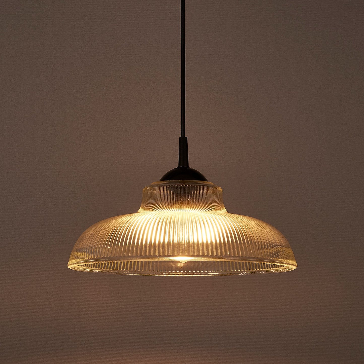 Glass lighting has proven very popular in the lighting sector, and we are extremely happy to introduce the Jacinta to our range. Our ribbed glass easy fit light pendant is a very attractive light fitting and easy fit means you can give your room a makeover by simply attaching it to an existing light fitting. This modern glass shade is perfect for all kinds of modern living space especially over counter and kitchen islands.