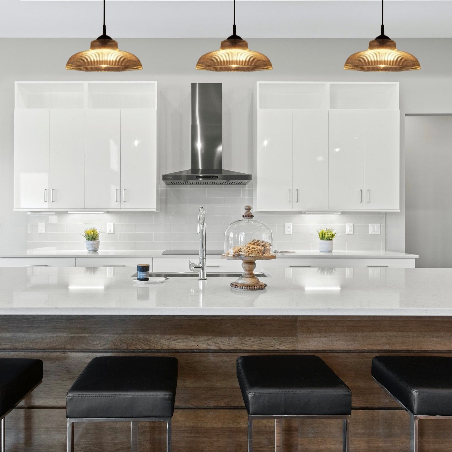 Glass lighting has proven very popular in the lighting sector, and we are extremely happy to introduce the Jacinta to our range. Our ribbed glass easy fit light pendant is a very attractive light fitting and easy fit means you can give your room a makeover by simply attaching it to an existing light fitting. This modern glass shade is perfect for all kinds of modern living space especially over counter and kitchen islands.