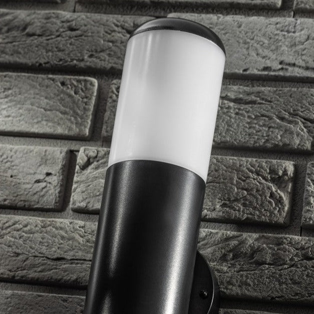 Our Humera black wall mounted round cylinder outdoor light would look perfect in a modern or more traditional home design. Outside wall lights can provide atmospheric light in your garden, at the front door or on the terrace as well as a great security solution. It is designed for durability and longevity with its robust material producing a fully weatherproof and water resistant light fitting.