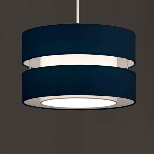 Our Navy Gayle two tiered luxury fabric double layered shade is contemporary in its appearance and we have designed the shade to suit a range of interiors. Easy to fit simply attached to an existing pendant flitting.  It is crafted from high quality fabric material in two layers and complimented with a white inner which looks beautiful when light shines through. The shade has been made to fit both a ceiling light or lamp base.