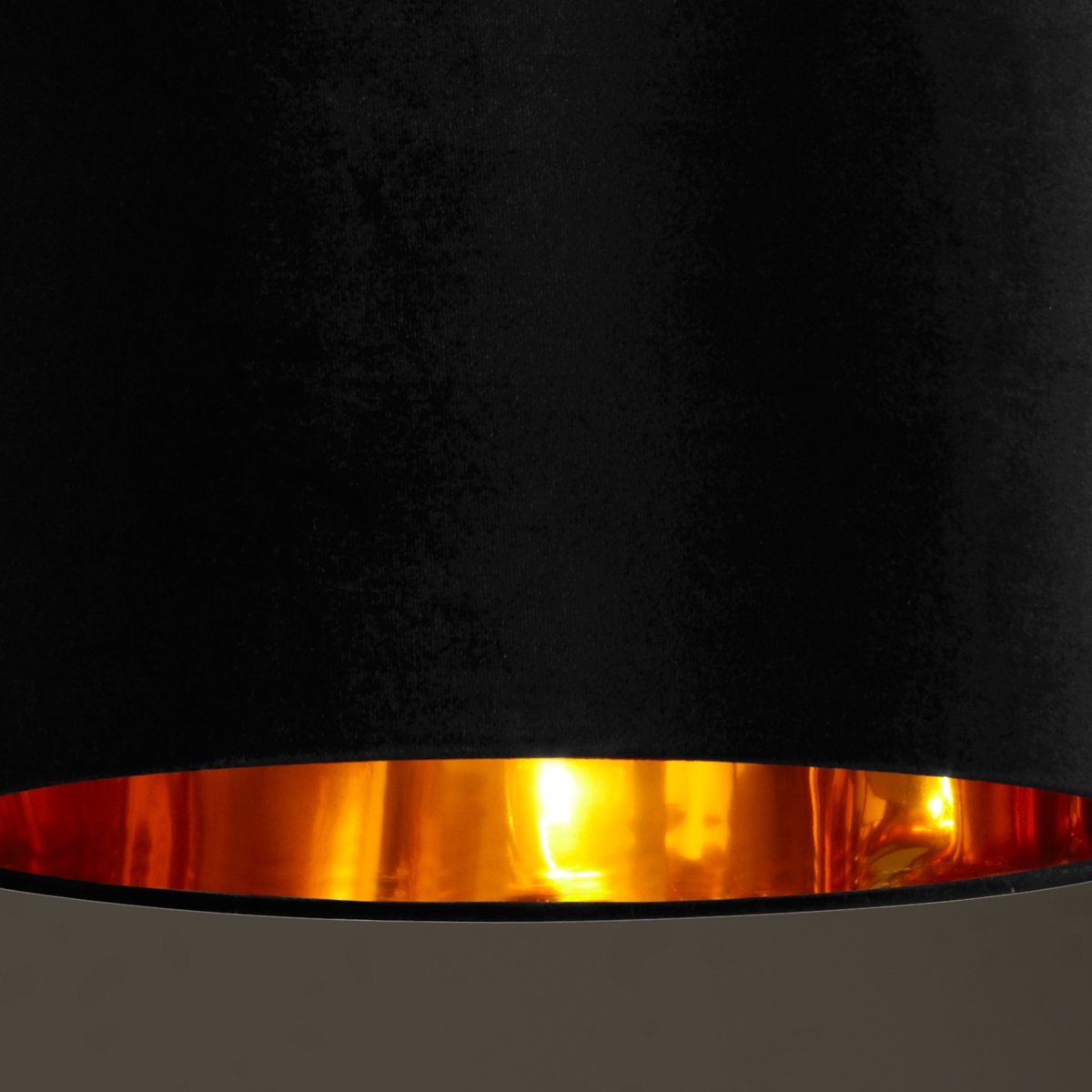 Our Nila velvet shade is sophisticated in appearance and we have designed the shade to  suit a range of interiors. Easy to fit, it’s crafted from high-quality velvet on the outer and has a reflective gold metallic inner. It's made to fit both a ceiling light or lamp base.