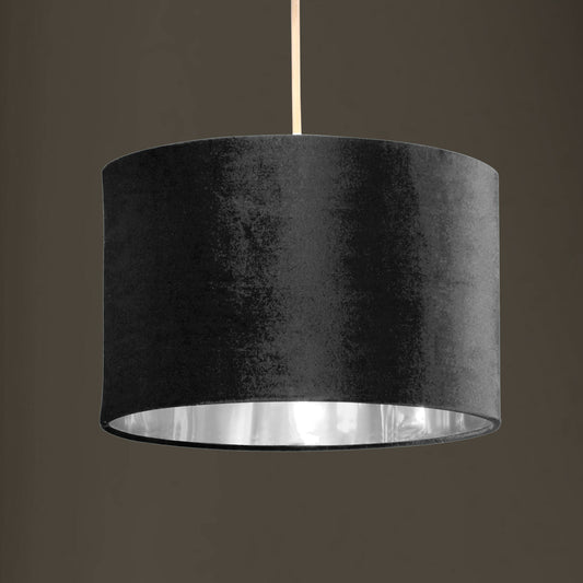 Our Nila velvet shade is sophisticated in appearance and we have designed the shade to  suit a range of interiors. Easy to fit, it’s crafted from high-quality velvet on the outer and has a reflective silver metallic inner. It's made to fit both a ceiling light or lamp base.