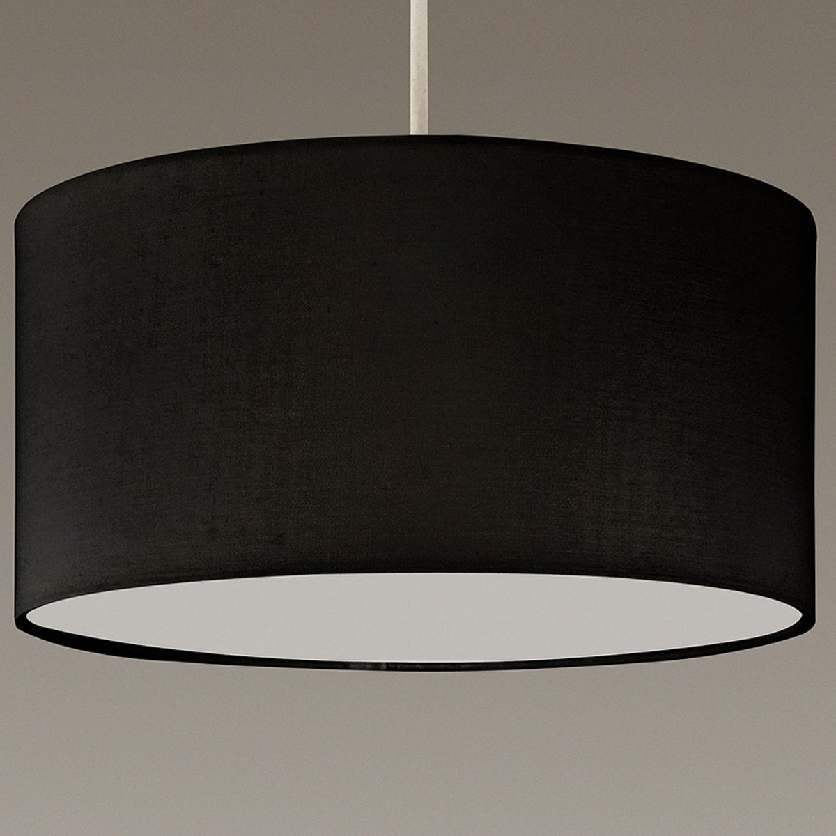 The Lucia is a modern cylinder drum shaped lamp shade in a luxury cotton finish and opal diffuser. This fantastic shade can double up as either a ceiling pendant light shade or table lampshade. Easily fits to your standard ceiling light socket - no wiring required.