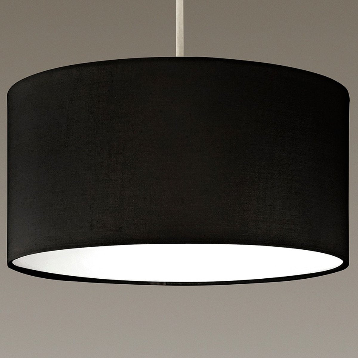 The Lucia is a modern cylinder drum shaped lamp shade in a luxury cotton finish and opal diffuser. This fantastic shade can double up as either a ceiling pendant light shade or table lampshade. Easily fits to your standard ceiling light socket - no wiring required.